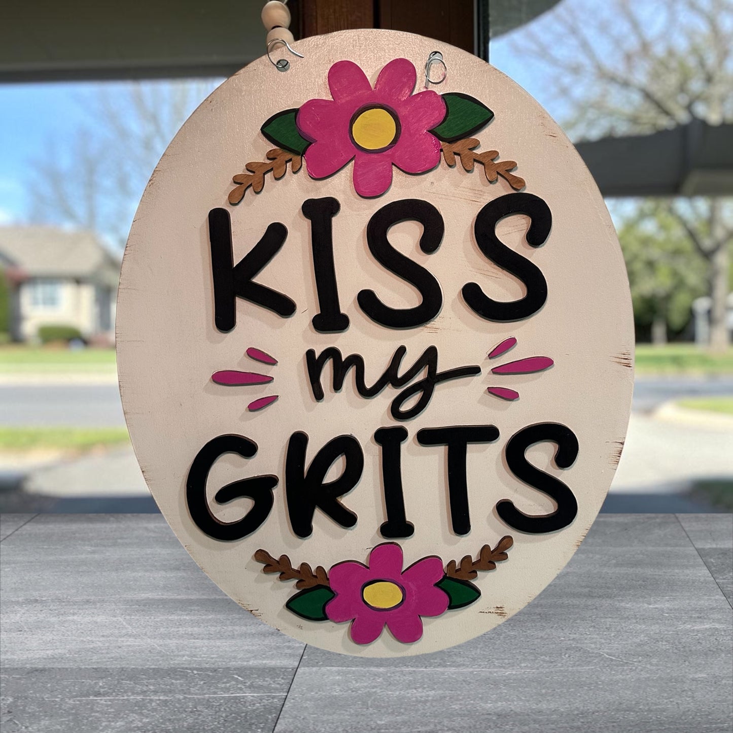 Vintage hand-painted wood door hangers, made to order in Iowa. Choose from fun farmhouse, sassy, and seasonal designs — perfect for porch or gift.